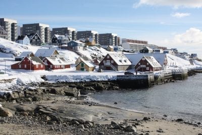 Nuuk covered in snow on a sunny day