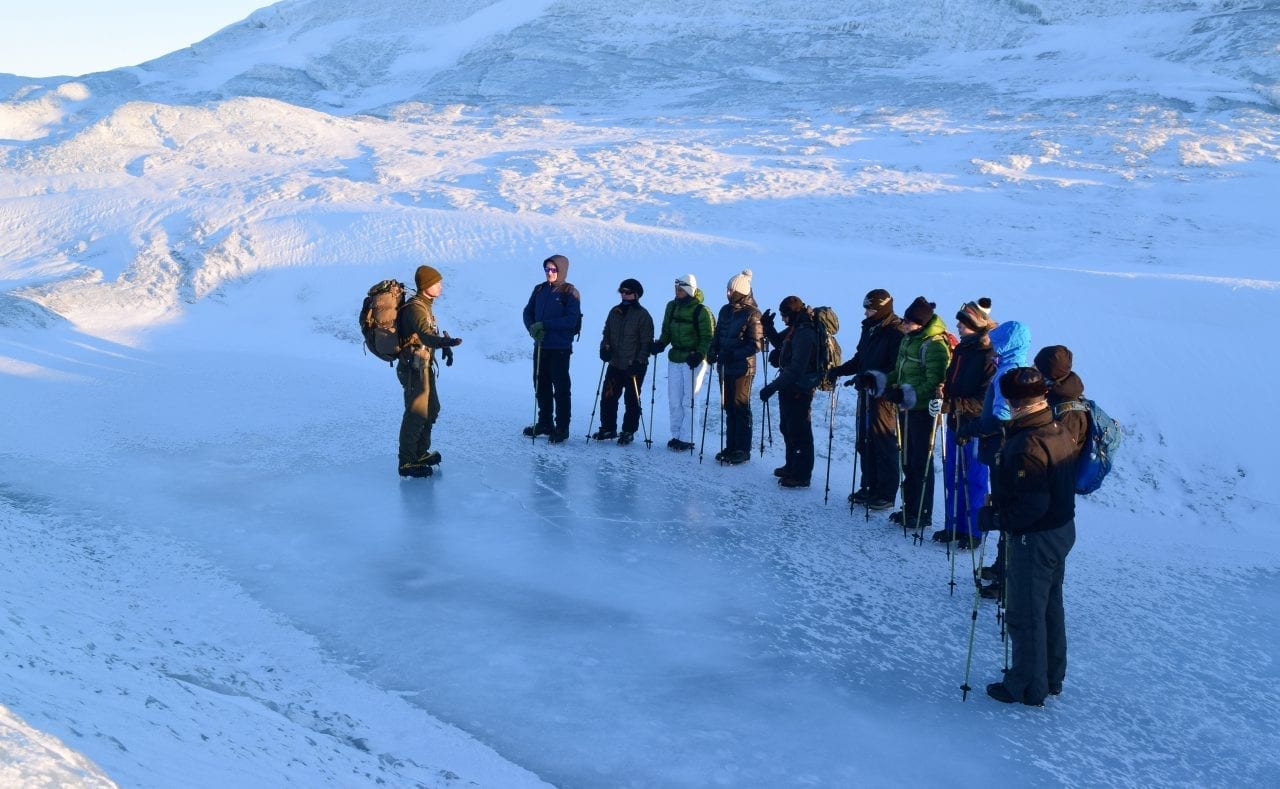 Hikers on a snowshoe walk near Kangerlussuaq