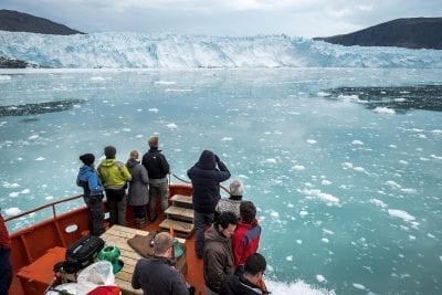 A Tour Boat Near The Eqi Glacier In North Greenland - Photographer: Mads Pihl